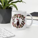 white-glossy-mug-white-11-oz-office-environment-691f453addfa2